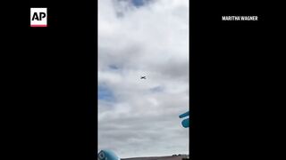Pilot dies after plane crashes at air show in South Africa.