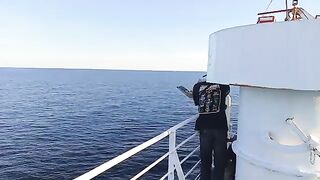 Returning home aboard a ship, with vast ocean views