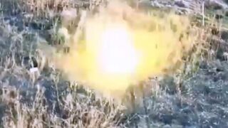 Ukrainian tank at close range shoots a trench with Russian soldiers