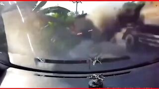 The moment a truck hit a tanker and immediately rolled over