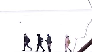 Children test the ice for strength