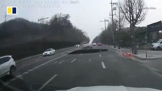Giant sinkhole in Seoul kills motorcyclist.