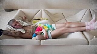 Justin Bieber Lounges on Sofa With Baby Jack Blues Bieber in Sweet.
