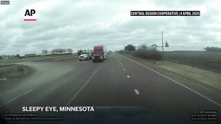 Video captures freight train crashing through grain truck in Minnesota.