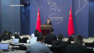 China vows to fight tariffs 'to the end,' saying trade with US is already balanced.