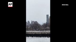 Video captures helicopter crash in the Hudson River in New York City.
