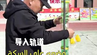 A physics teacher explains to his students