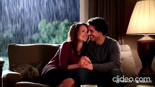 Couple In Romantic Mood In Heavy Rain