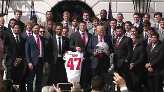 JD Vance fumbles college football championship trophy as Ohio State visits White House.