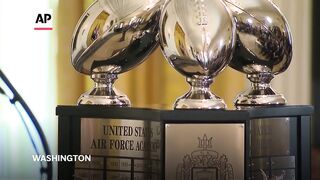 Trump presents Commander-in-Chief's Trophy to Navy football.