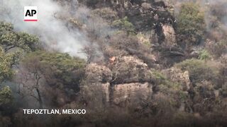 Fires rage through protected area near Mexico City.