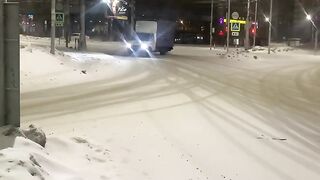 A Gazelle car drifts along a snowy road