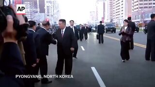 North Korea's Kim Jong Un and daughter attend ceremony for a construction project.