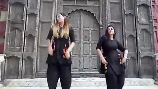 amazing dance performance two girls same color in black dresses