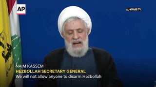 Hezbollah says it won’t hand over weapons while Israeli troops remain in Lebanon.