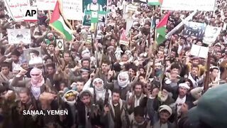 Protesters in Yemen burn US and Israel flags after strikes targeting Houthi rebels.