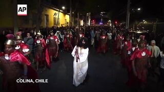 Worshippers in Chile take part in Via Crucis performance.