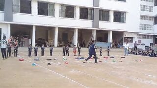 Small boy running compitition in ground