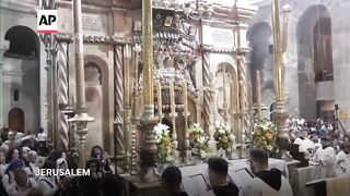 Jerusalem's Christians gather for Easter service at the Church of the Holy Sepulcher.