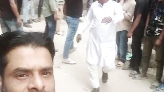 আমি এখন একটা রাজনৈতিক সমাবেশে
