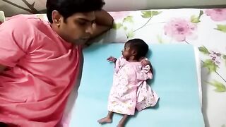 Baby Playing With Dad