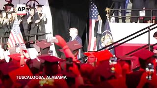 Trump gives speech to graduating students at the University of Alabama.
