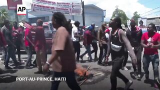 Protesters in Haiti demand new government as anger over gangs spreads.