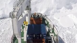 How polar explorers get to Antarctica: South African icebreaker Agulhas II hits an ice wall and drops scientists off at the very top.