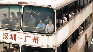 Journey Through Time: A Vintage Triple-Decker Bus on the Road to Progress