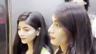 A guy create fun in lift for beautiful girls
