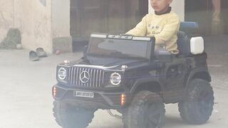 Baby driving car