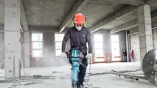 The process of removing concrete from the roof- Good tools and machinery make work easy