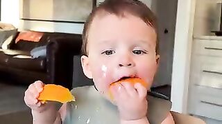 Baby Eating Mango