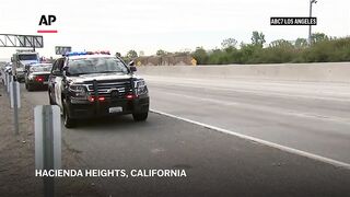 1 killed, 32 injured in collision of bus and SUV on Los Angeles area freeway.