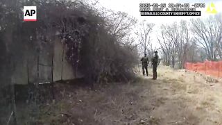 Drone video shows New Mexico deputies disarm children handling a loaded gun.