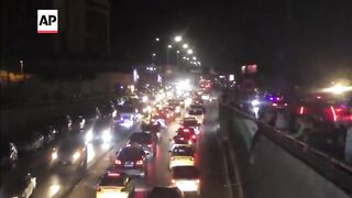 Syrians celebrate after Trump announces easing of sanctions.