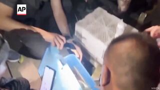 Thailand police rescue two baby orangutans from being sold in Bangkok.