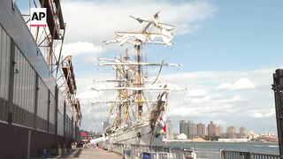 Crew disembark the Mexican ship that collided with the Brooklyn Bridge in New York.