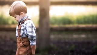 Kid and duckling