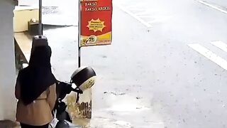 MOTORBIKE ROBBERY OF A MOTHER