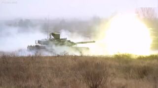 Russian tanks storm battlefield and blast Ukrainian positions