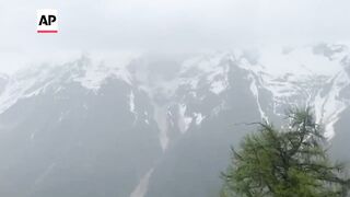 Video shows glacier collapse in Switzerland, destroying Alpine village.