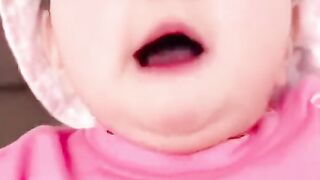 Cute baby saying mama and papa