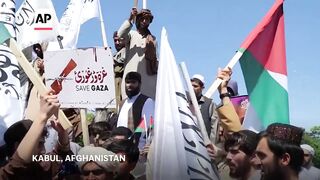 Protesters in Afghanistan march in support of Palestinians in Gaza.