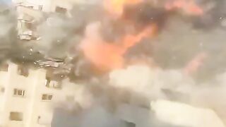 Close up footage documenting the first moments of the Israeli occupation strike on Al-Noor Tower in northern Gaza.