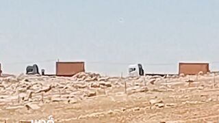 Israeli settlers bring mobile homes into the town of Bani Na’im, east of occupied Hebron.