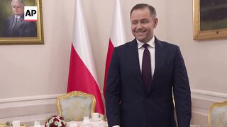 Poland President-elect Karol Nawrocki meets outgoing President Duda.