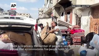 Palestinians flee Khan Younis in Gaza after Israeli army evacuation order.