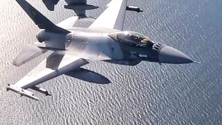 F-16s Breaking Formation: Romanian Falcons Soar Over Baltic Skies (Slow Motion)