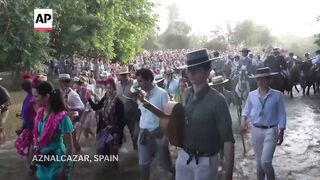 Catholic pilgrims gather in El Rocío in Spain to venerate an icon of the Virgin Mary, AP explains.